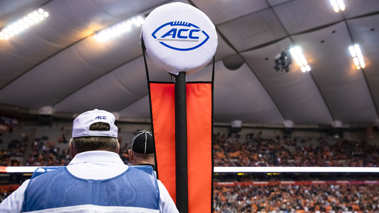 SYRACUSE, NY - OCTOBER 27: An official stands with a down marker bearing the ACC logo during the game between the Syracuse Orange and the North Carolina State Wolfpack at the Carrier Dome on October 27, 2018 in Syracuse, New York. Syracuse upsets North Carolina State 51-41. *** Local Caption ***