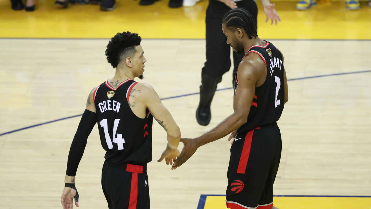 OAKLAND, CA - JUNE 5: Danny Green #14 hi-fives Kawhi Leonard #2 of the Toronto Raptors during Game Three of the NBA Finals on June 5, 2019 at ORACLE Arena in Oakland, California. NOTE TO USER: User expressly acknowledges and agrees that, by downloading and/or using this photograph, user is consenting to the terms and conditions of Getty Images License Agreement. Mandatory Copyright Notice: Copyright 2019 NBAE
