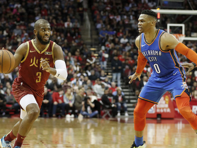HOUSTON, TX - FEBRUARY 09: Chris Paul #3 of the Houston Rockets drives to the basket defended by Russell Westbrook #0 of the Oklahoma City Thunder in the first half at Toyota Center on February 9, 2019 in Houston, Texas.