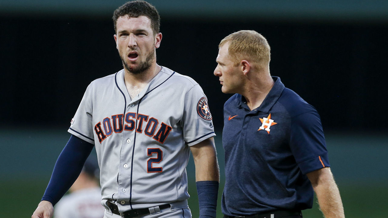 ARLINGTON, TX - JULY 11: Shortstop Alex Bregman #2 of the Houston Astros leaves the game after being hit the face by the ball during the third inning of a baseball game against the Texas Rangers at Globe Life Park July 11, 2019 in Arlington, Texas. Texas won 5-0.