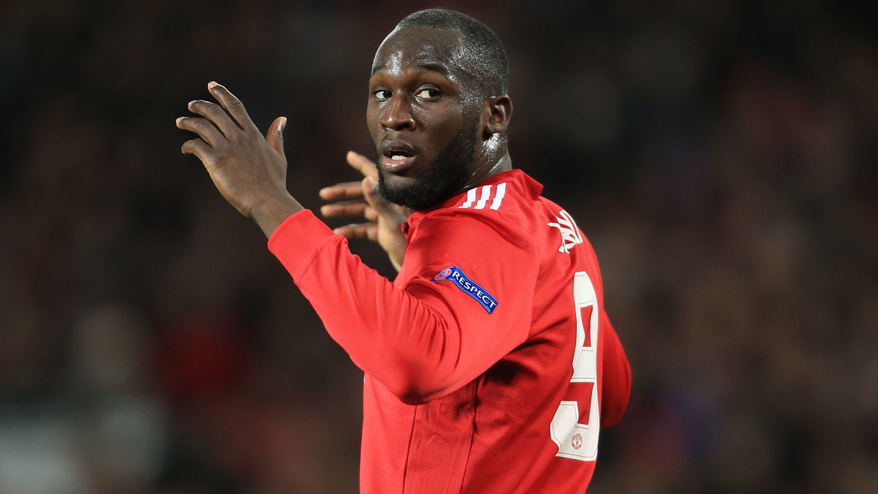 MANCHESTER, ENGLAND - MARCH 13: Romelu Lukaku of Man Utd reacts after seeing Sevilla goalkeeper Sergio Rico save an effort from Marouane Fellaini of Man Utd during the UEFA Champions League Round of 16 Second Leg match between Manchester United and Sevilla FC at Old Trafford on March 13, 2018 in Manchester, United Kingdom.