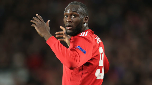MANCHESTER, ENGLAND - MARCH 13: Romelu Lukaku of Man Utd reacts after seeing Sevilla goalkeeper Sergio Rico save an effort from Marouane Fellaini of Man Utd during the UEFA Champions League Round of 16 Second Leg match between Manchester United and Sevilla FC at Old Trafford on March 13, 2018 in Manchester, United Kingdom.