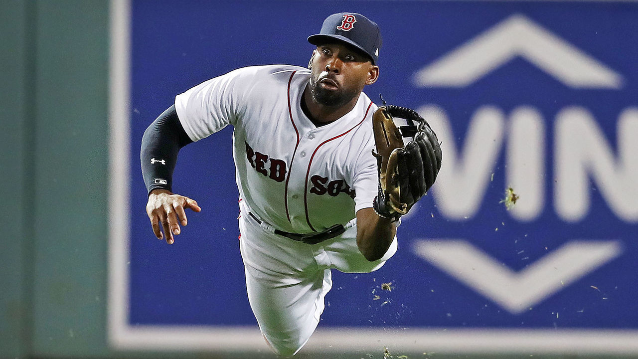 BOSTON - SEPTEMBER 26: Boston Red Sox centerfielder Jackie Bradley, Jr. makes a diving catch to rob the Orioles' Caleb Joseph of a hit in the top of the eighth inning. The Boston Red Sox host the Baltimore Orioles in the second of two regular season MLB baseball games in a doubleheader at Fenway Park in Boston on Sep. 26, 2018.