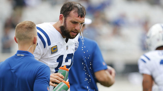 JACKSONVILLE, FL - DECEMBER 02: Indianapolis Colts Quarterback Andrew Luck (12) cools off with some water during the game between the Indianapolis Colts and the Jacksonville Jaguars on December 2, 2018 at TIAA Bank Field in Jacksonville, Fl.