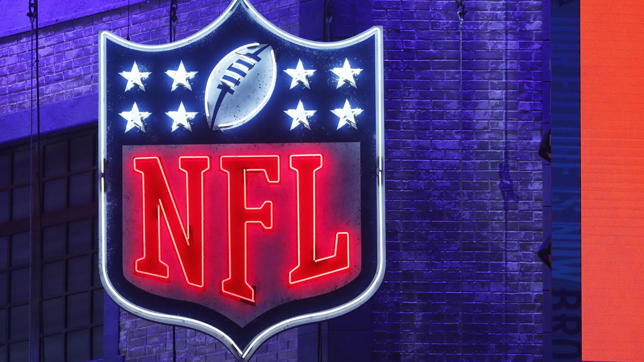 NASHVILLE, TN - APRIL 25: Detail view of the NFL shield logo in neon lights during the first round of the NFL Draft on April 25, 2019 in Nashville, Tennessee.