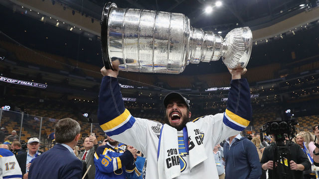 BOSTON, MASSACHUSETTS - JUNE 12: Robby Fabbri #15 of the St. Louis Blues holds the Stanley Cup following the Blues victory over the Boston Bruins at TD Garden on June 12, 2019 in Boston, Massachusetts.