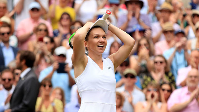 Simona Halep celebrates winning the women's singles final on day twelve of the Wimbledon Championships at the All England Lawn Tennis and Croquet Club, Wimbledon.