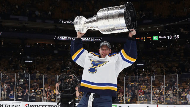 BOSTON, MASSACHUSETTS - JUNE 12: Jordan Binnington #50 of the St. Louis Blues holds the Stanley Cup following the Blues victory over the Boston Bruins at TD Garden on June 12, 2019 in Boston, Massachusetts.