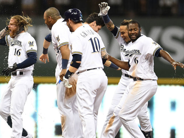 Braun, Yelich, Moustakas pay tribute to Skaggs with special jersey