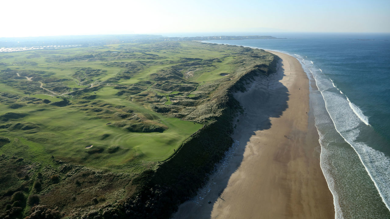 PORTRUSH, NORTHERN IRELAND - OCTOBER 10: An aerial photograph of a general view from above the green on the par 4, fifth hole with the 6th, 7th, 8th, and 10th holes immediately behind and the beach running back to the town of Portrush on the Dunluce Links the host venue for the 2019 Open Championship at Royal Portrush Golf Club on October 10, 2018 in Portrush, Northern Ireland.