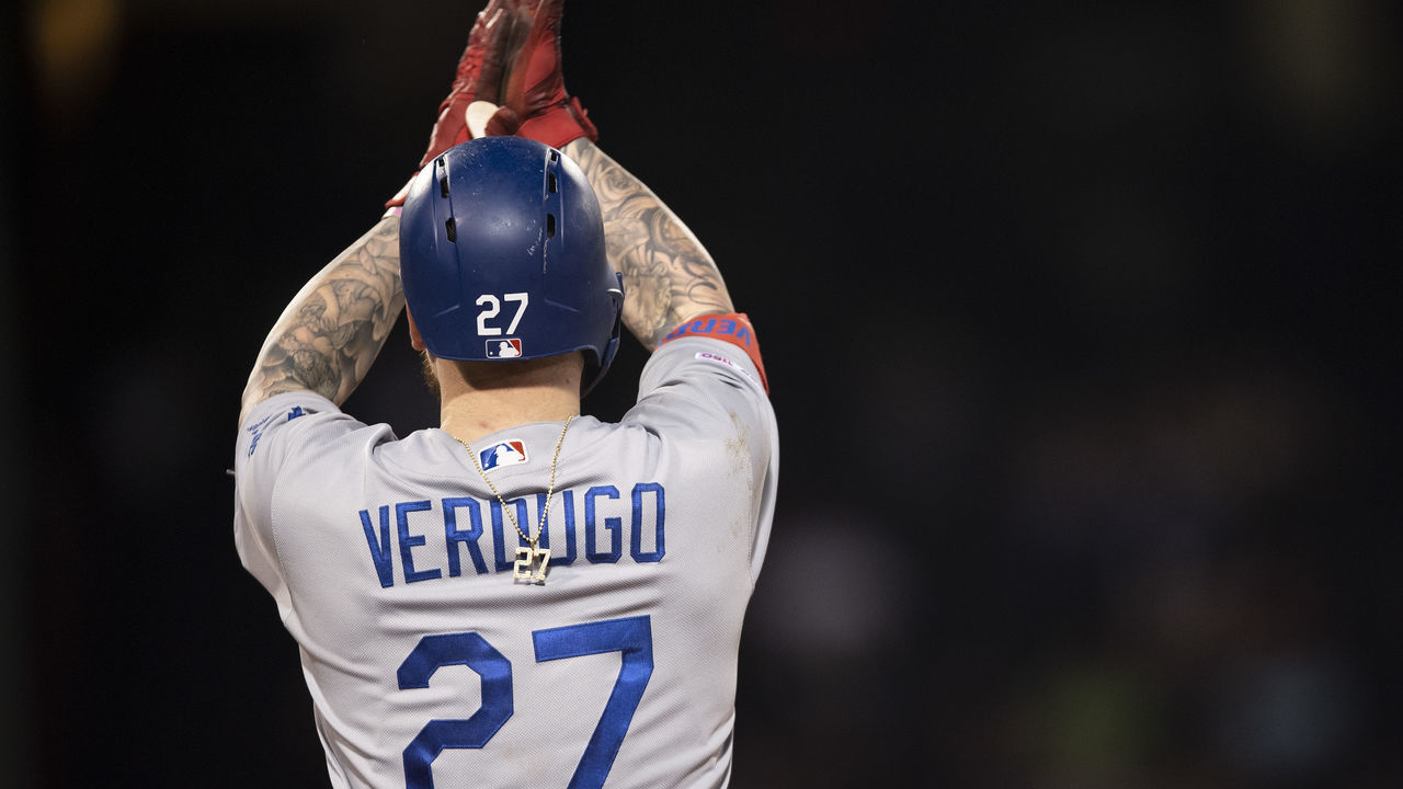 BOSTON, MA - JULY 14: Alex Verdugo #27 of the Los Angeles Dodgers reacts after hitting an RBI single during the twelfth inning of game against the Boston Red Sox on July 14, 2019 at Fenway Park in Boston, Massachusetts.