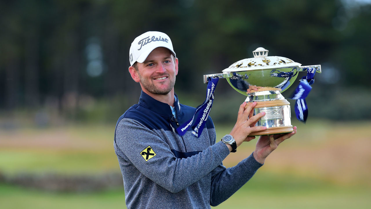 NORTH BERWICK, SCOTLAND - JULY 14: Bernd Weisberger of Austria, Winner of the Aberdeen Standard Investments Scottish Open poses with the trophy at the 18th green during The Open Qualifying Series, part of the Aberdeen Standard Investments Scottish Open at The Renaissance Club on July 14, 2019 in North Berwick, United Kingdom.
