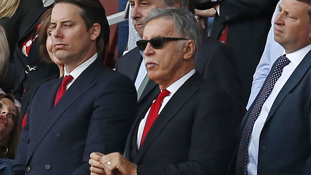 Arsenal's US owner Stan Kroenke (C) looks on during the presentation to Arsenal's French manager Arsene Wenger after the English Premier League football match between Arsenal and Burnley at the Emirates Stadium in London on May 6, 2018.