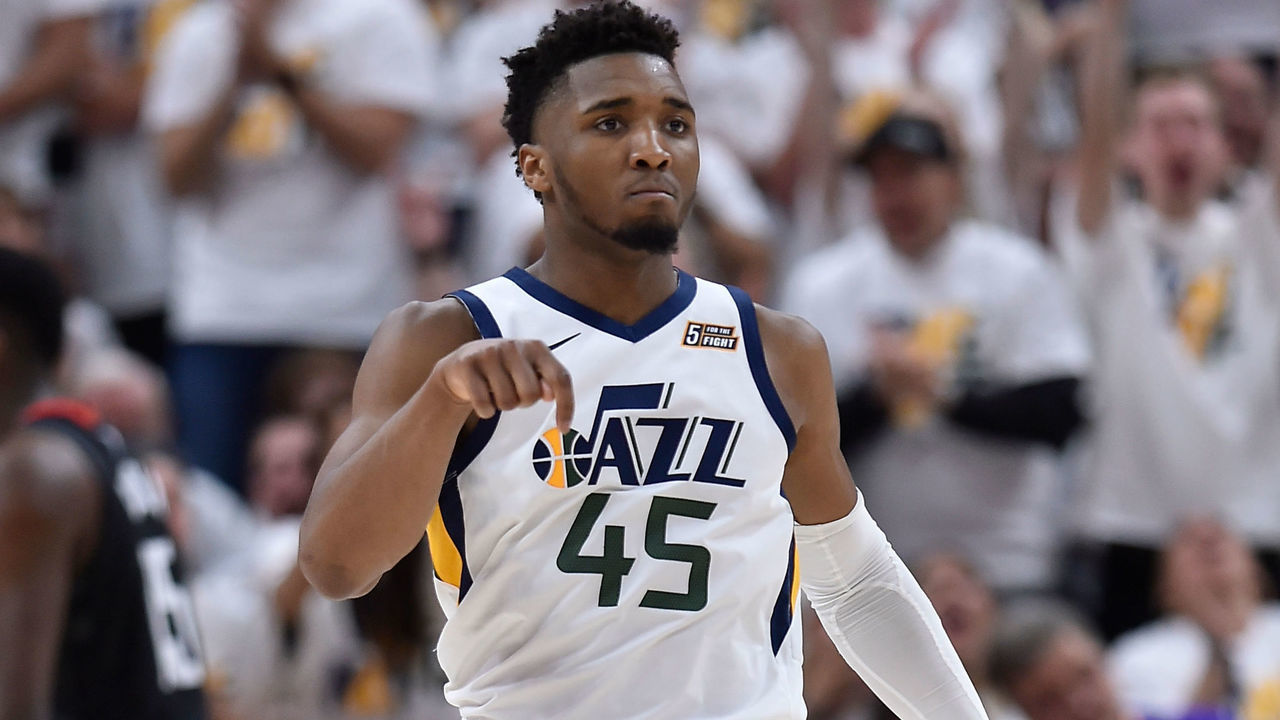 SALT LAKE CITY, UT - APRIL 22: Donovan Mitchell #45 of the Utah Jazz reacts to his three point basket in the second half of Game Four during the first round of the 2019 NBA Western Conference Playoffs against the Houston Rockets at Vivint Smart Home Arena on April 22, 2019 in Salt Lake City, Utah.