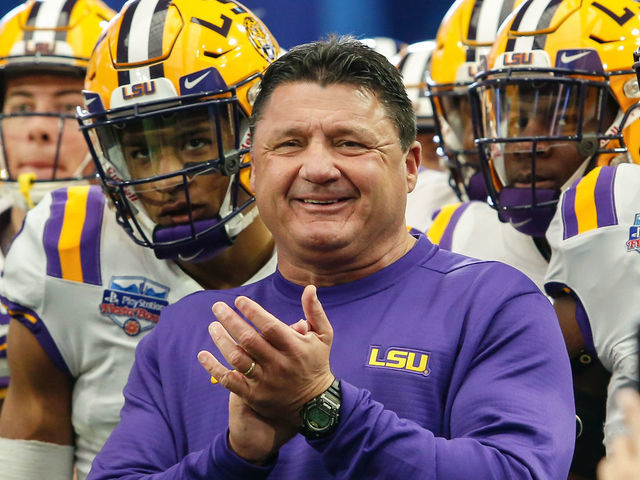 GLENDALE, AZ - JANUARY 01: LSU Tigers head coach Ed Orgeron smiles as his team prepares to run onto the field before the college football game between the UCF Knights and the LSU Tigers on January 1, 2019 at State Farm Stadium in Glendale, Arizona.