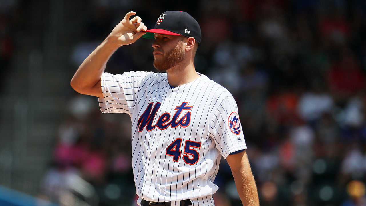 NEW YORK, NEW YORK - JULY 07: Zack Wheeler #45 of the New York Mets looks on against the Philadelphia Phillies during their game at Citi Field on July 07, 2019 in New York City.