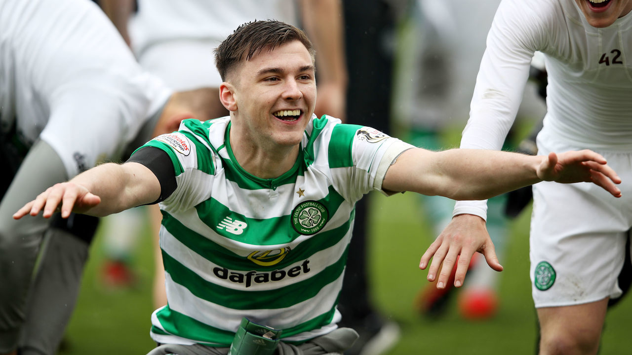 ABERDEEN, SCOTLAND - MAY 04: Kieran Tierney of Celtic celebrates as his side secured the Ladbrokes Scottish Premiership title after the Ladbrokes Scottish Premiership match between Aberdeen and Celtic at Pittodrie Stadium on May 04, 2019 in Aberdeen, Scotland.