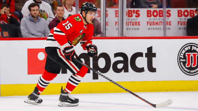 CHICAGO, IL - APRIL 1: Artem Anisimov #15 of the Chicago Blackhawks follows the play up the ice during first period action against the Winnipeg Jets at the United Center on April 1, 2019 in Chicago, Illinois. The Jets defeated the Hawks 4-3 in overtime.