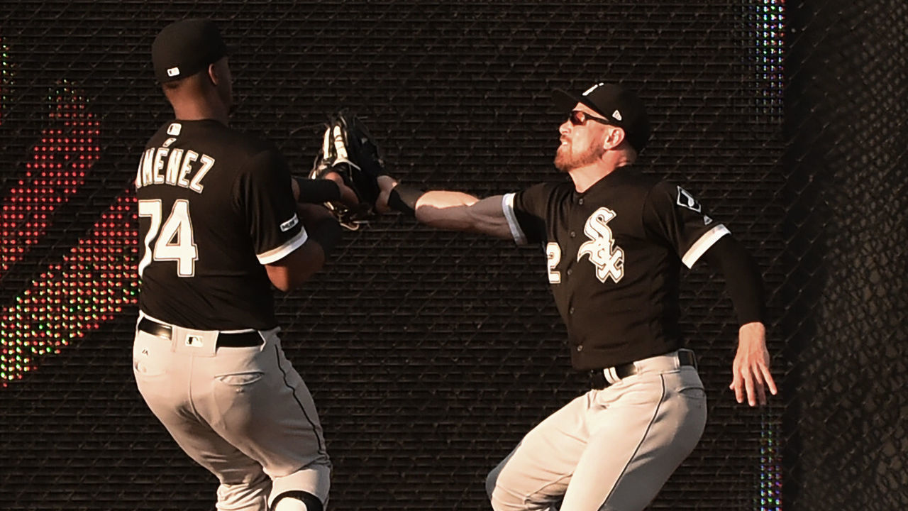 KANSAS CITY, MISSOURI - JULY 16: Center fielder Charlie Tilson #22 of the Chicago White Sox catches a ball hit by Whit Merrifield of the Kansas City Royals against teammate Eloy Jimenez #74 of the Chicago White Sox in the first inning at Kauffman Stadium on July 16, 2019 in Kansas City, Missouri.