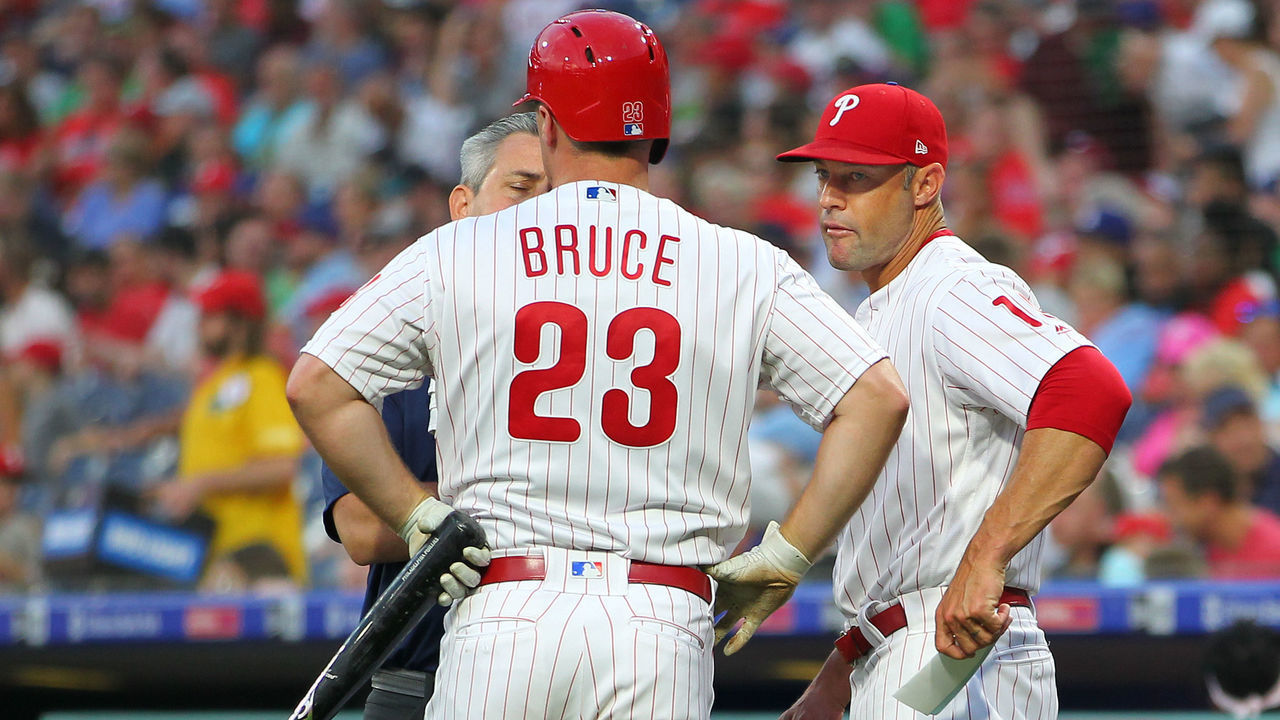 PHILADELPHIA, PA - JULY 16: Jay Bruce #23 of the Philadelphia Phillies is is looked at by a member of the medical staff and manager Gabe Kapler #19 after injuring himself on a swing against the Los Angeles Dodgers during the third inning of a baseball game at Citizens Bank Park on July 16, 2019 in Philadelphia, Pennsylvania. Bruce left the game in the middle of his at-bat.
