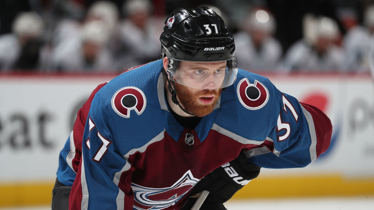 DENVER, CO - MAY 02:J.T. Compher #37 of the Colorado Avalanche waits for a face off against the San Jose Sharks in Game Four of the Western Conference Second Round during the 2019 NHL Stanley Cup Playoffs at the Pepsi Center on May 2, 2019 in Denver, Colorado.