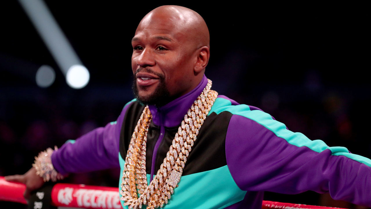 ARLINGTON, TEXAS - MARCH 16: Floyd Mayweather Jr. stands in the ring before Errol Spence Jr takes on Mikey Garcia in an IBF World Welterweight Championship bout at AT&T Stadium on March 16, 2019 in Arlington, Texas.