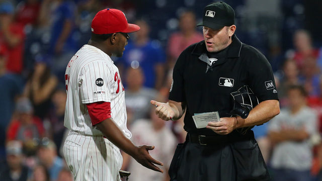 PHILADELPHIA, PA - JULY 16: Closer Hector Neris #50 of Philadelphia Phillies questions home plate umpire Chris Conroy on his ejection from the game after he hit David Freese #25 of the Los Angeles Dodgers in the head during the ninth inning of a baseball game at Citizens Bank Park on July 16, 2019 in Philadelphia, Pennsylvania. The Phillies defeated the Dodgers 9-8.