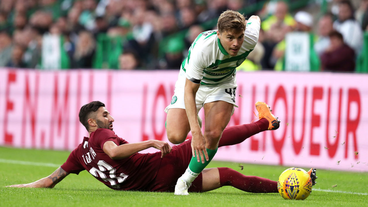 FK Sarajevo's Benjamin Tatar (left) and Celtic's James Forrest battle for the ball during the UEFA Champions League first qualifying round, second leg match at Celtic Park, Glasgow.