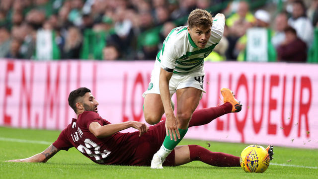FK Sarajevo's Benjamin Tatar (left) and Celtic's James Forrest battle for the ball during the UEFA Champions League first qualifying round, second leg match at Celtic Park, Glasgow.