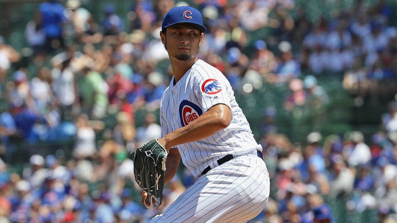 CHICAGO, ILLINOIS - JULY 17: Starting pitcher Yu Darvish #11 of the Chicago Cubs delivers the ball against the Cincinnati Reds at Wrigley Field on July 17, 2019 in Chicago, Illinois.