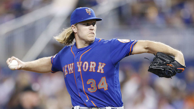 MIAMI, FLORIDA - JULY 13: Noah Syndergaard #34 of the New York Mets delivers a pitch in the first inning against the Miami Marlins at Marlins Park on July 13, 2019 in Miami, Florida.