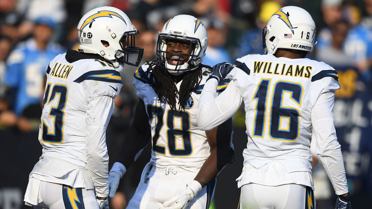 OAKLAND, CA - NOVEMBER 11: Melvin Gordon #28 of the Los Angeles Chargers celebrates after a 66-yard touchdown against the Oakland Raiders during their NFL game at Oakland-Alameda County Coliseum on November 11, 2018 in Oakland, California.