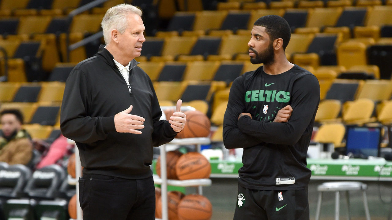 BOSTON, MA - NOVEMBER 17: General Manager Danny Ainge and Kyrie Irving #11 of the Boston Celtics talk before the game against the Utah Jazz on November 17, 2018 at the TD Garden in Boston, Massachusetts. NOTE TO USER: User expressly acknowledges and agrees that, by downloading and/or using this photograph, user is consenting to the terms and conditions of the Getty Images License Agreement. Mandatory Copyright Notice: Copyright 2018 NBAE