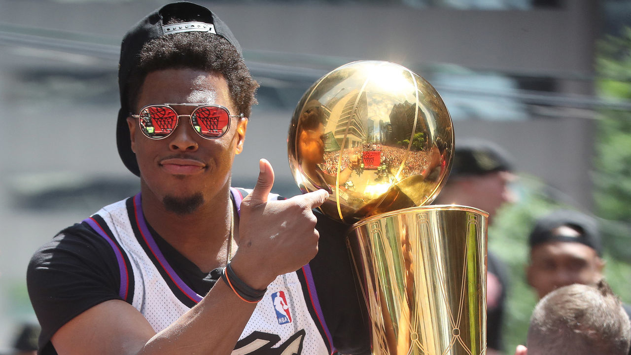 TORONTO, ON- JUNE 17 - Kyle Lowry with the Larry O'Brien NBA Championship Trophy as the Toronto Raptors hold their victory parade after beating the Golden State Warriors in the NBA Finals in Toronto. June 17, 2019. (Steve Russell/Toronto Star via Getty Images)