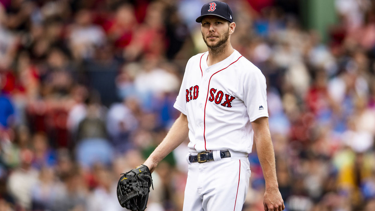 BOSTON, MA - JULY 18: Chris Sale #41 of the Boston Red Sox reacts during the fifth inning of a game against the Toronto Blue Jays on July 18, 2019 at Fenway Park in Boston, Massachusetts.