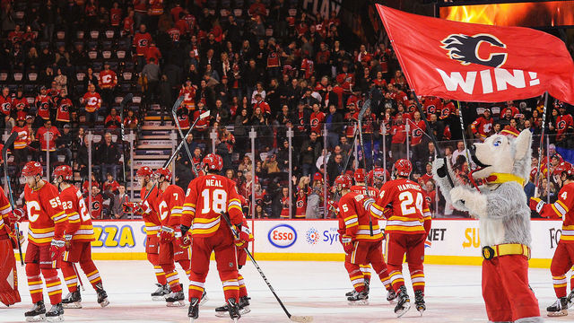 CALGARY, AB - NOVEMBER 3: The Calgary Flames salute the crowd after defeating the Chicago Blackhawks during an NHL game at Scotiabank Saddledome on November 3, 2018 in Calgary, Alberta, Canada.