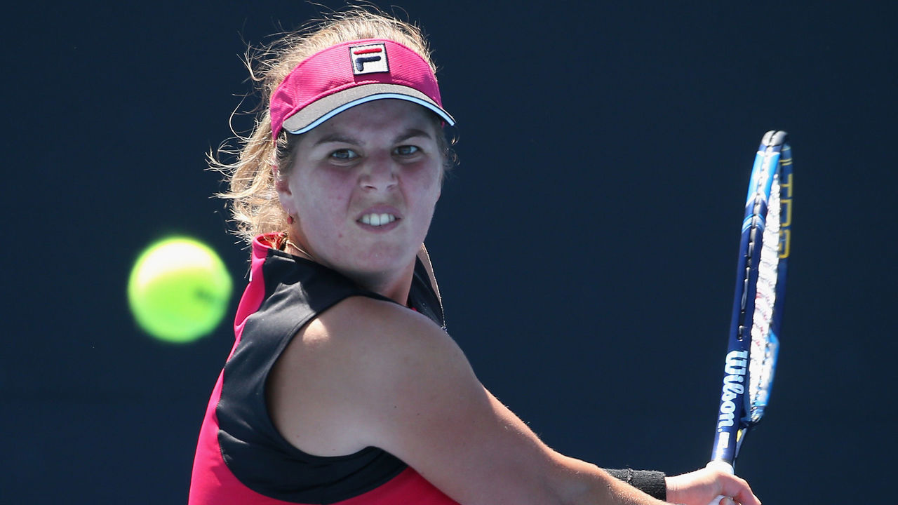 MELBOURNE, AUSTRALIA - JANUARY 16: Anna Tatishvili of the USA plays a backhand during her first round match against Jaimee Fourlis of the USA on day one of the 2017 Australian Open at Melbourne Park on January 16, 2017 in Melbourne, Australia.