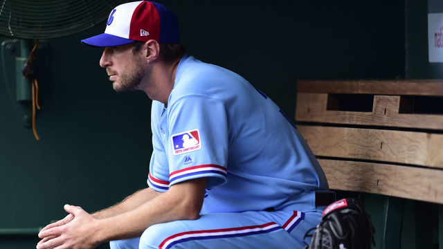 WASHINGTON, DC - JULY 06: Max Scherzer #31 of the Washington Nationals sits in the dugout before a game against the Kansas City Royals at Nationals Park on July 6, 2019 in Washington, DC. The Nationals are paying tribute to the Montreal Expos by wearing retro jerseys.