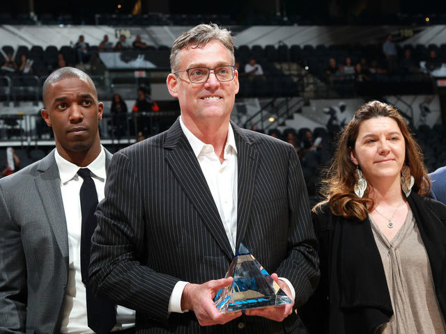 SAN ANTONIO, TX - MAY 10: R. C. Buford general manager of the San Antonio Spurs receives an excecutive of the year award before the game against the Oklahoma City Thunder in Game Five of the Western Conference Semifinals during the 2016 NBA Playoffs on May 10, 2016 at the AT&T Center in San Antonio, Texas. Mandatory Copyright Notice: Copyright 2016 NBAE (Photos by Layne Murdoch/NBAE via Getty Images)