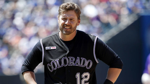 DENVER, CO - JUNE 12: Mark Reynolds #12 of the Colorado Rockies looks on during a game against the Chicago Cubs at Coors Field on June 12, 2019 in Denver, Colorado. The Cubs won 10-1.
