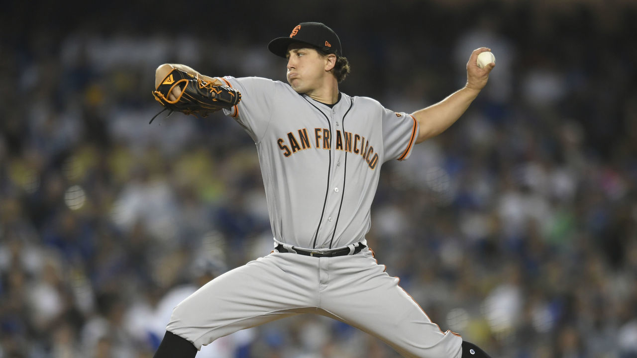 LOS ANGELES, CA - JUNE 18: Derek Holland #45 of the San Francisco Giants pitches against the Los Angeles Dodgers in the seventh inning Los Angeles Dodgersat Dodger Stadium on June 18, 2019 in Los Angeles, California.
