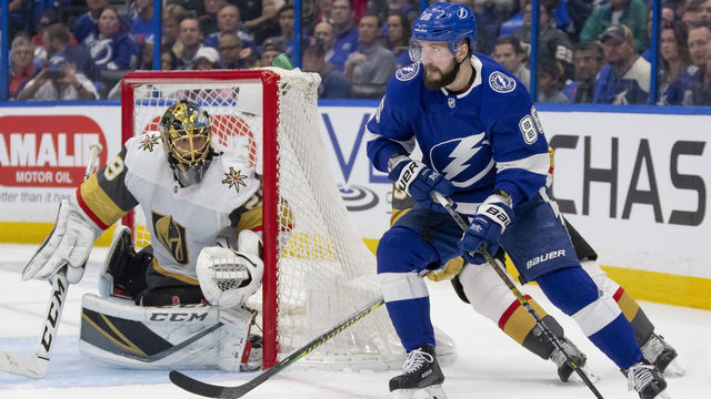 TAMPA, FL - FEBRUARY 05: Tampa Bay Lightning right wing Nikita Kucherov (86) looks to pass the puck during the NHL Hockey match between the Tampa Bay Lightning and Vegas Golden Nights on February 05, 2019, at Amalie Arena in Tampa, FL.