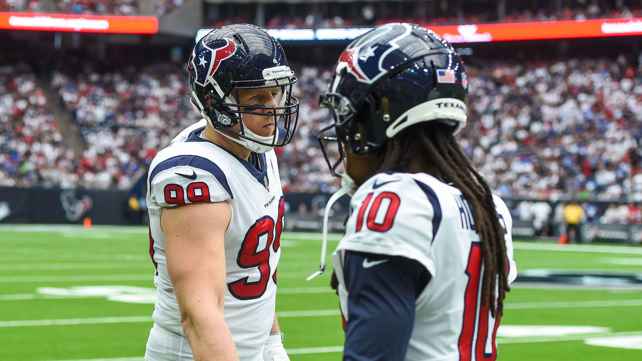 HOUSTON, TX - SEPTEMBER 23: Houston Texans defensive end J.J. Watt (99) congratulates wide receiver DeAndre Hopkins (10) during the football game between the New York Giants and Houston Texans on September 23, 2018 at NRG Stadium in Houston, TX.