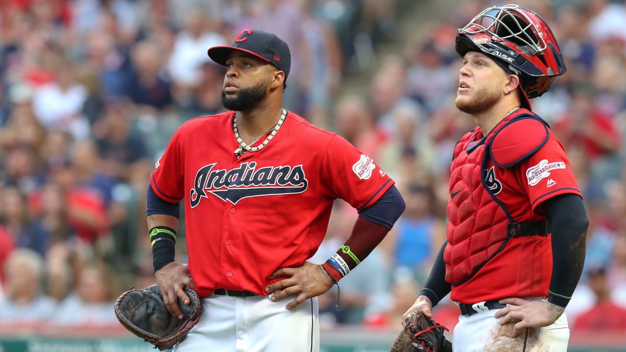 CLEVELAND, OH - JULY 19: Cleveland Indians shortstop Francisco Lindor (12) and Cleveland Indians catcher Roberto Perez (55) watch a replay on the scoreboard during the third inning of the Major League Baseball game between the Kansas City Royals and Cleveland Indians on July 19, 2019, at Progressive Field in Cleveland, OH.