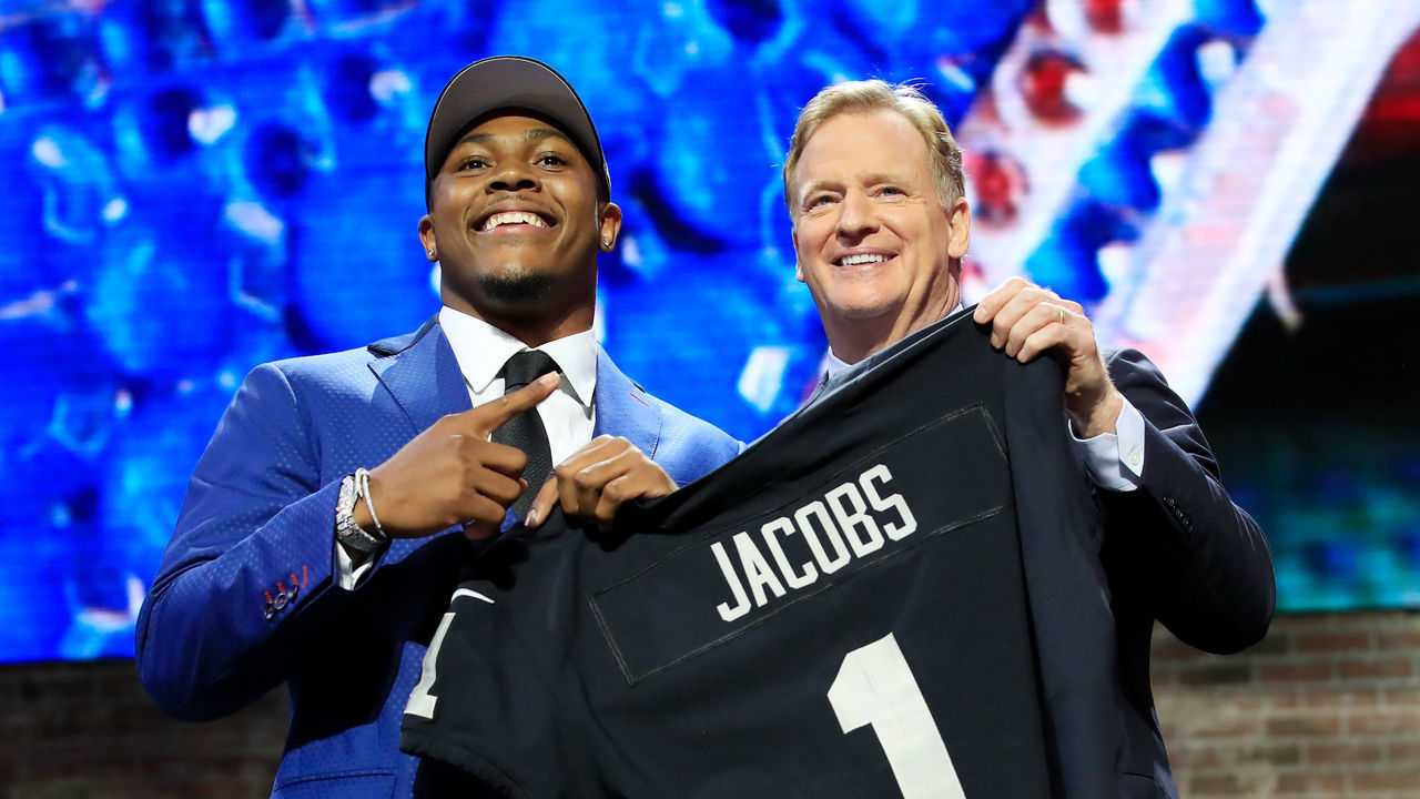 NASHVILLE, TENNESSEE - APRIL 25: Josh Jacobs of Alabama poses with NFL Commissioner Roger Goodell after being chosen #24 overall by the Oakland Raiders during the first round of the 2019 NFL Draft on April 25, 2019 in Nashville, Tennessee.