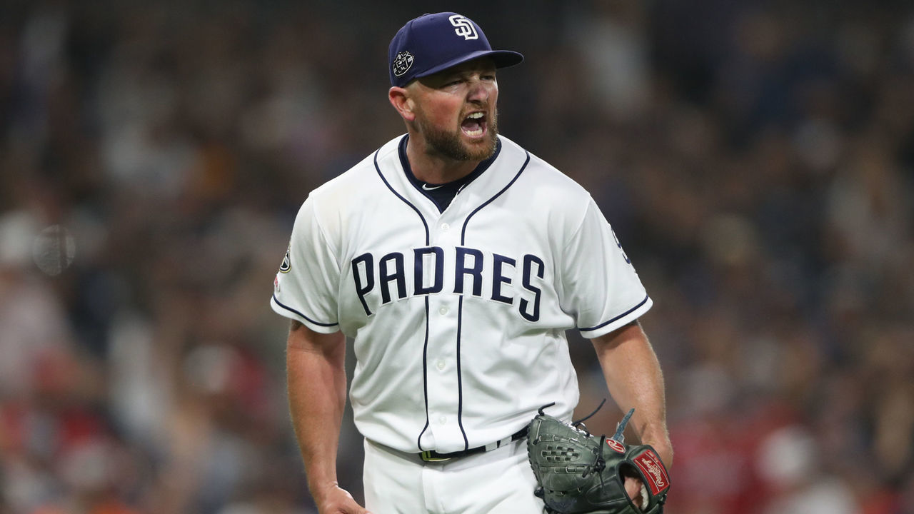 SAN DIEGO, CALIFORNIA - JULY 13: Kirby Yates #39 of the San Diego Padres reacts to striking out Freddie Freeman #5 of the Atlanta Braves during the ninth inning of a game at PETCO Park on July 13, 2019 in San Diego, California.