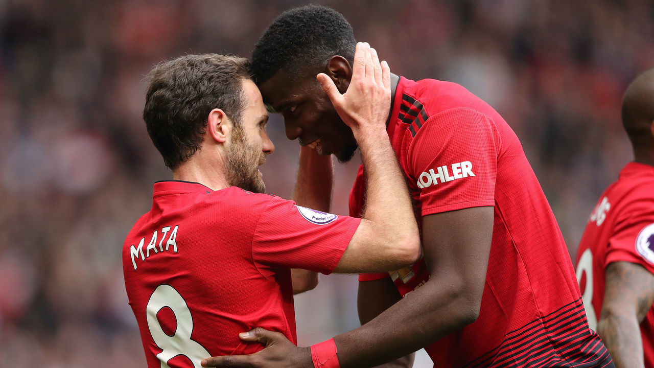 MANCHESTER, ENGLAND - APRIL 28: Juan Mata of Manchester United celebrates after scoring a goal to make it 1-0 with Paul Pogba during the Premier League match between Manchester United and Chelsea FC at Old Trafford on April 28, 2019 in Manchester, United Kingdom.