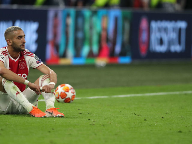 AMSTERDAM, NETHERLANDS - MAY 08: A dejected Hakim Ziyech of Ajax Amsterdam reacts at full time during the UEFA Champions League Semi Final second leg match between Ajax and Tottenham Hotspur at the Johan Cruyff Arena on May 8, 2019 in Amsterdam, Netherlands.