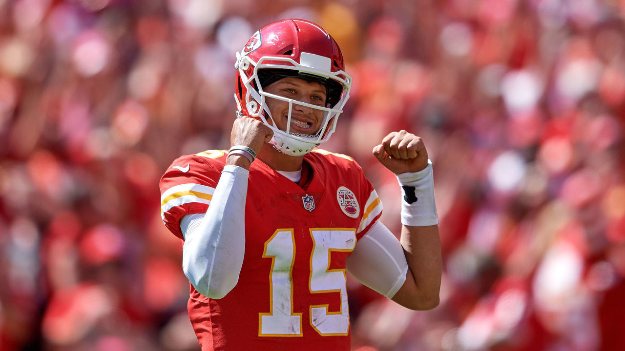 KANSAS CITY, MO - SEPTEMBER 23: Kansas City Chiefs quarterback Patrick Mahomes (15) raises his arms as he celebrates after throwing for a touchdown in game action during a NFL game between the San Francisco 49ers and the Kansas City Chiefs on September 23, 2018, at Arrowhead Stadium in Kansas City, MO.