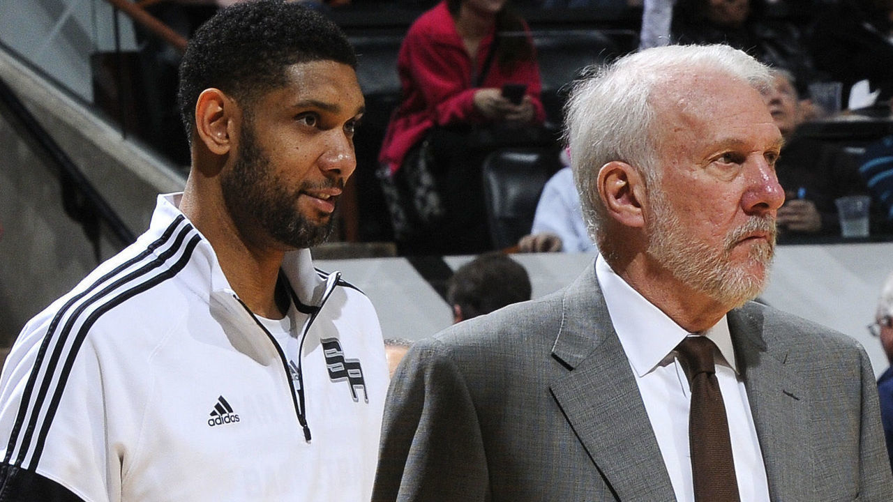 SAN ANTONIO - January 18: Tim Duncan #21 and head coach Gregg Popovich of the San Antonio Spurs during the game against the Utah Jazz at the AT&T Center on January 18, 2014 in San Antonio, Texas. Mandatory Copyright Notice: Copyright 2015 NBAE (Photos by D. Clarke Evans/NBAE via Getty Images)